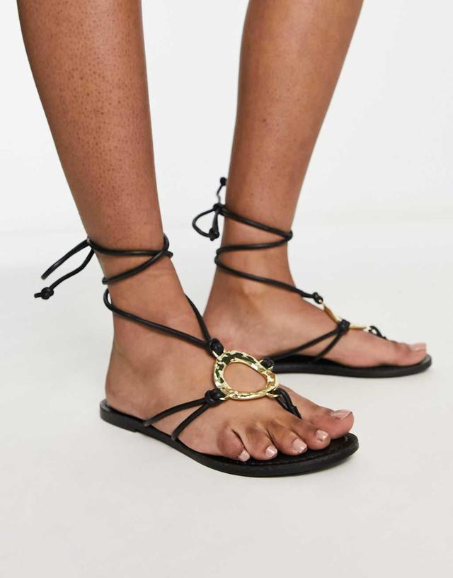 ASOS DESIGN Flourish bashed hardware flat sandals in black Product Image