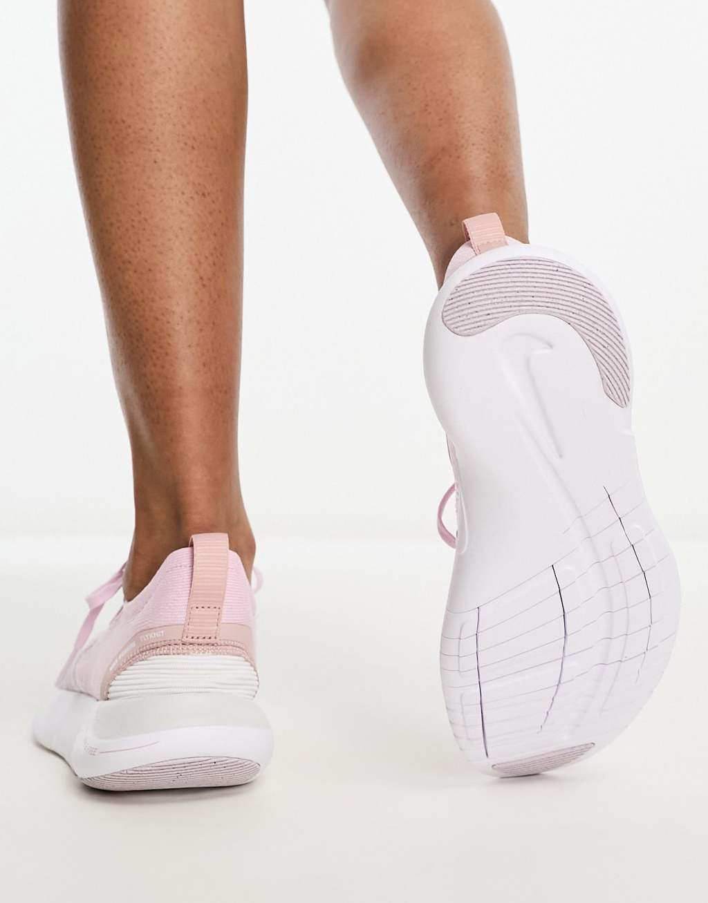 Nike Free Run Flyknit sneakers in pink Product Image