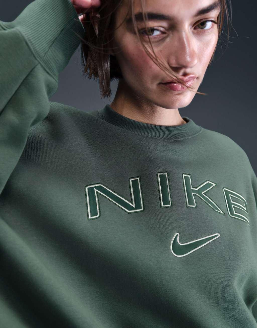 Nike Phoenix Fleece over-oversized logo sweatshirt in dark green Product Image