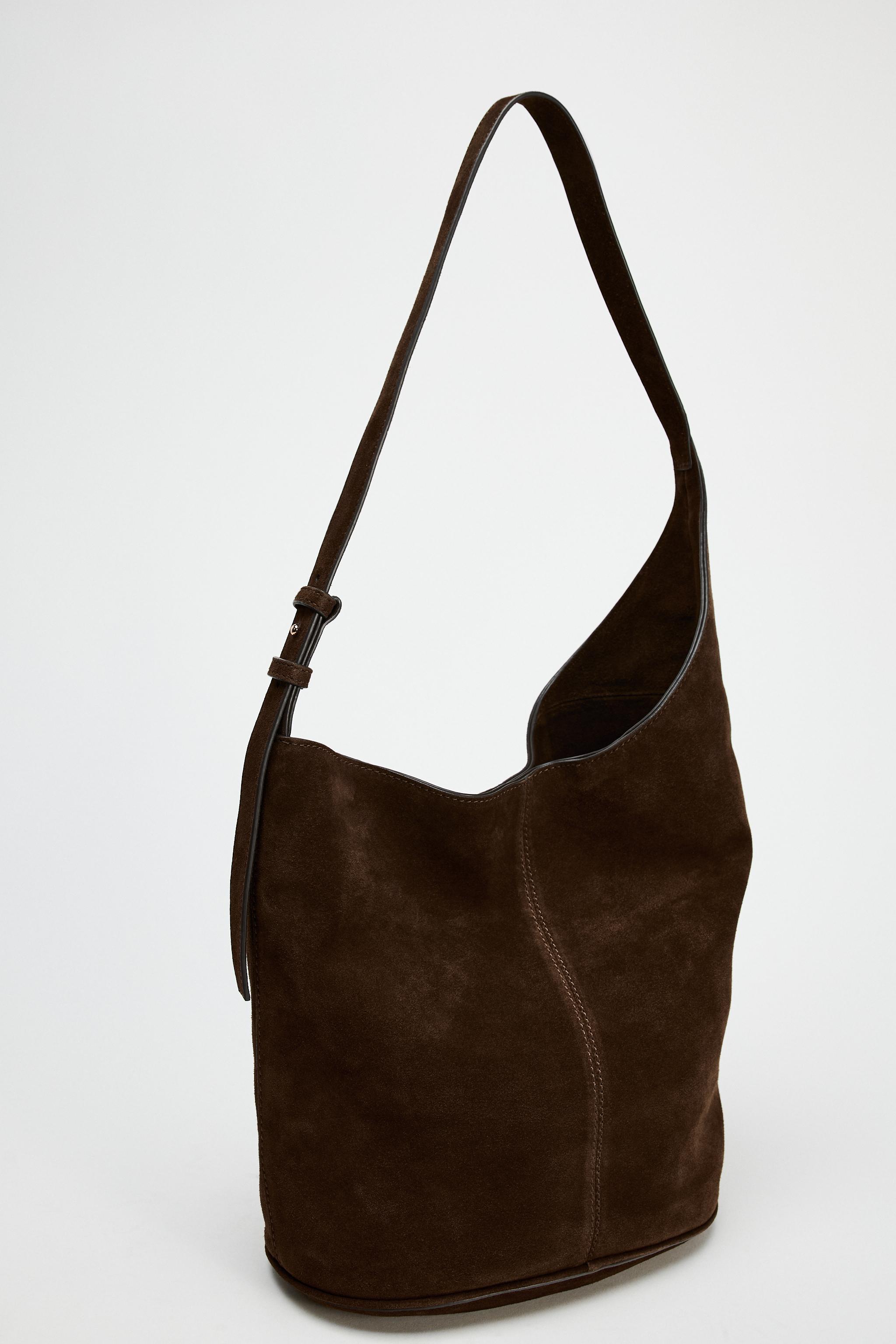 ASYMMETRIC SOFT SPLIT LEATHER BUCKET BAG Product Image