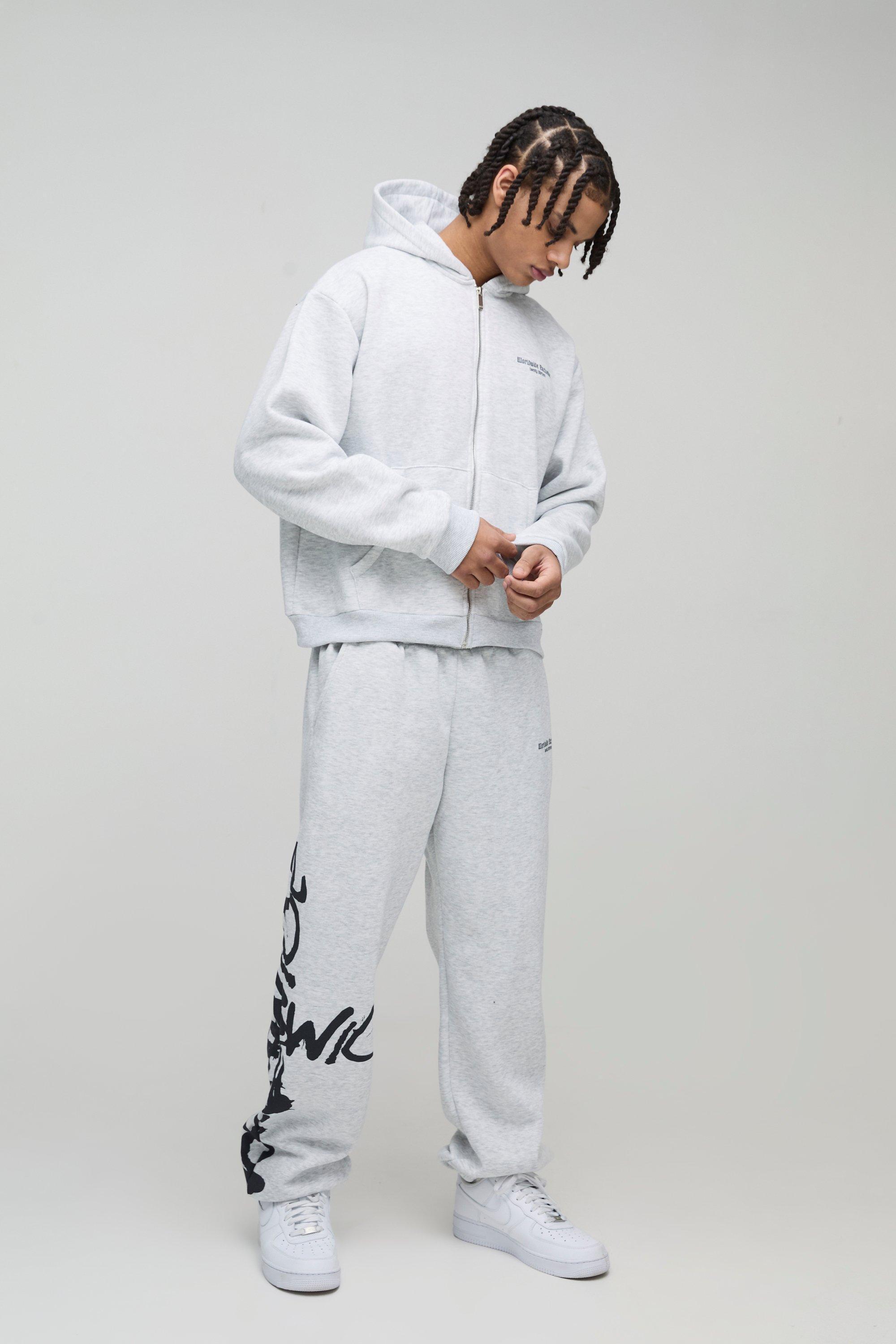 Oversized Boxy Zip Through Worldwide Graffiti Print Zip Through Tracksuit | boohooMAN USA product image