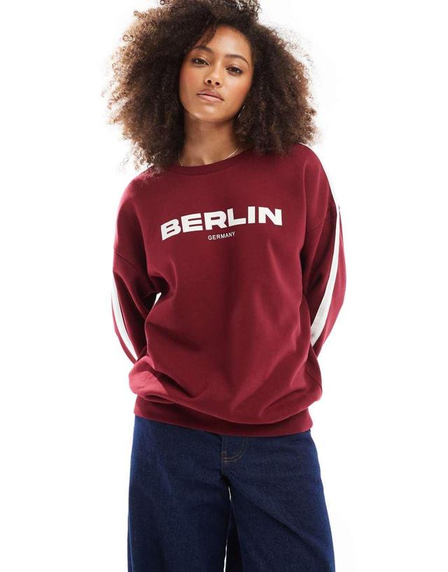 ASOS DESIGN Berlin graphic oversized sweatshirt in burgundy Product Image