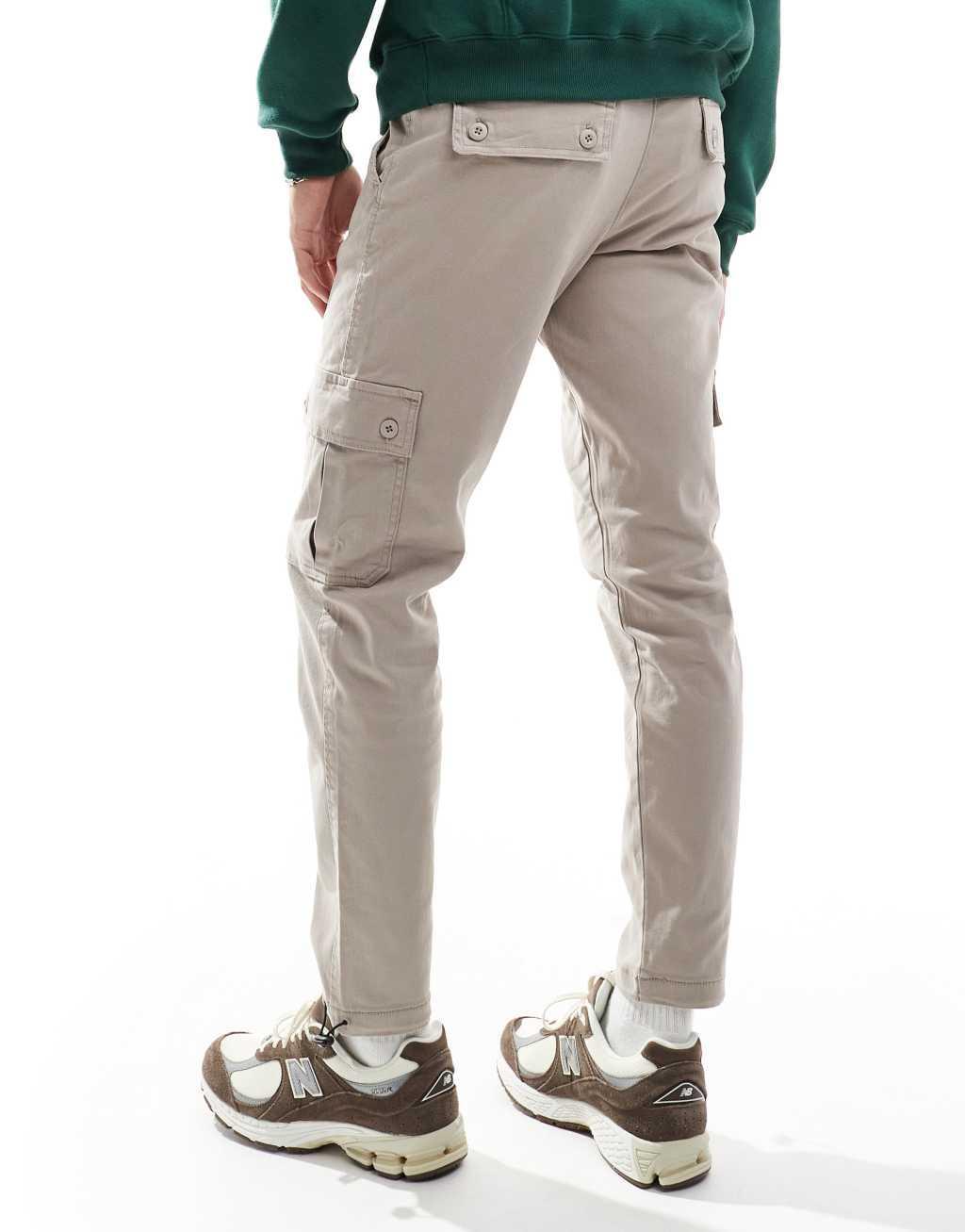 ASOS DESIGN tapered cargo pants in beige Product Image