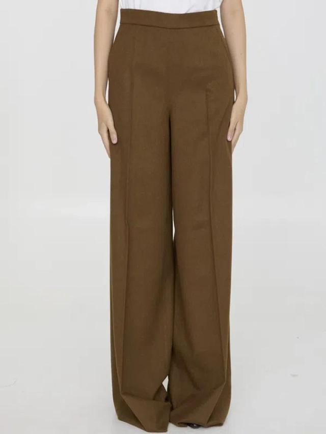 Axe Trousers In Brown Product Image