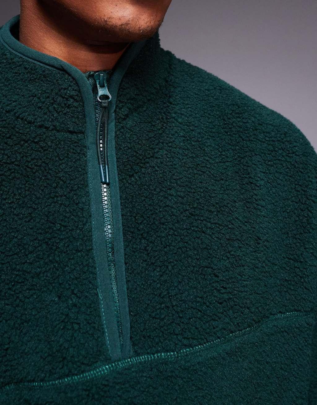 ASOS DESIGN oversized borg half zip sweatshirt in dark green Product Image