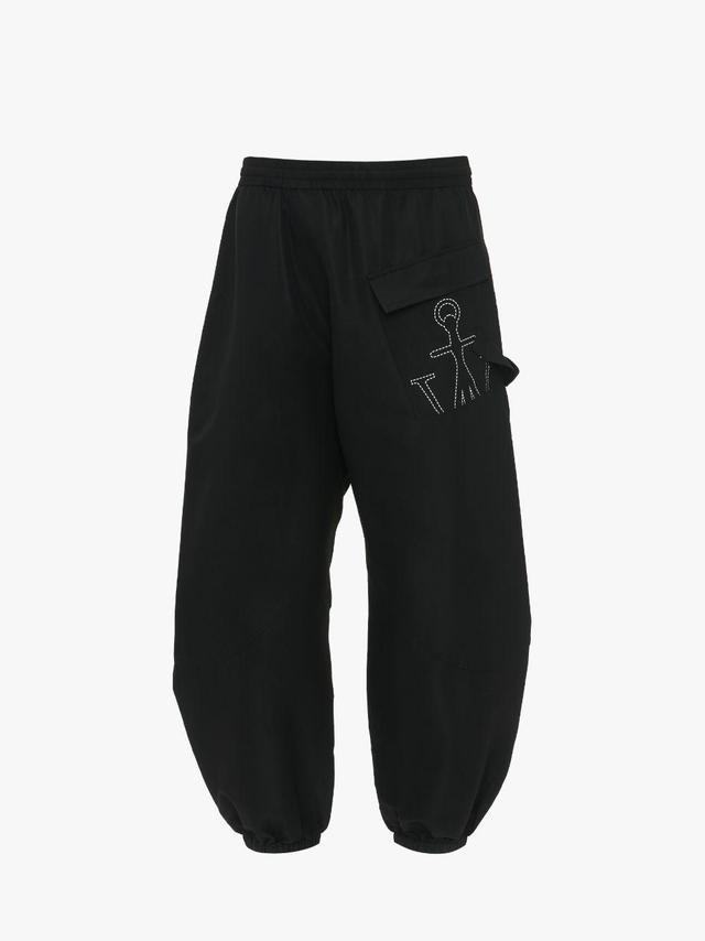 TWISTED JOGGERS WITH ANCHOR LOGO PRINT in black | JW Anderson US  Product Image