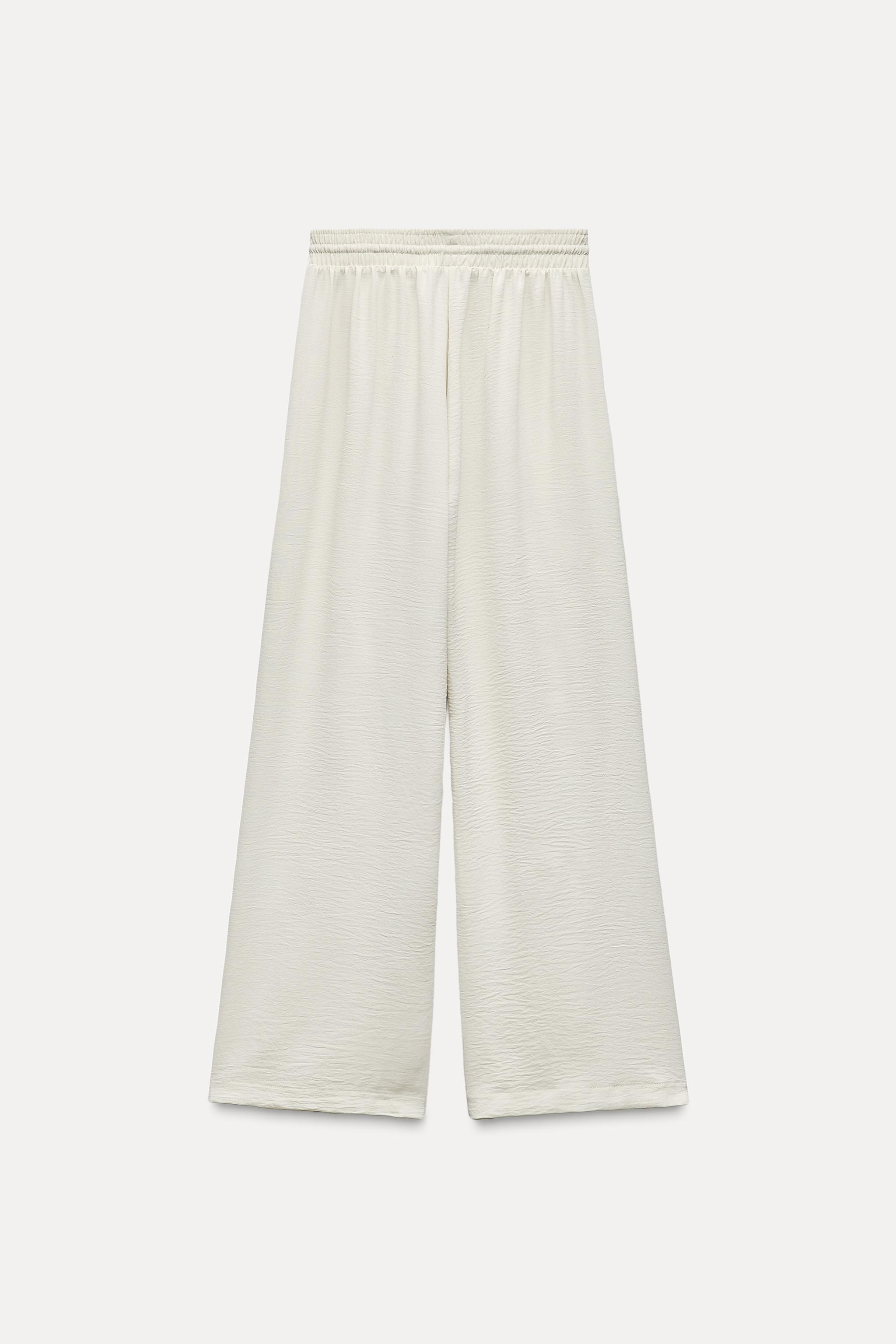 FLOWY PLEATED PANTS Product Image