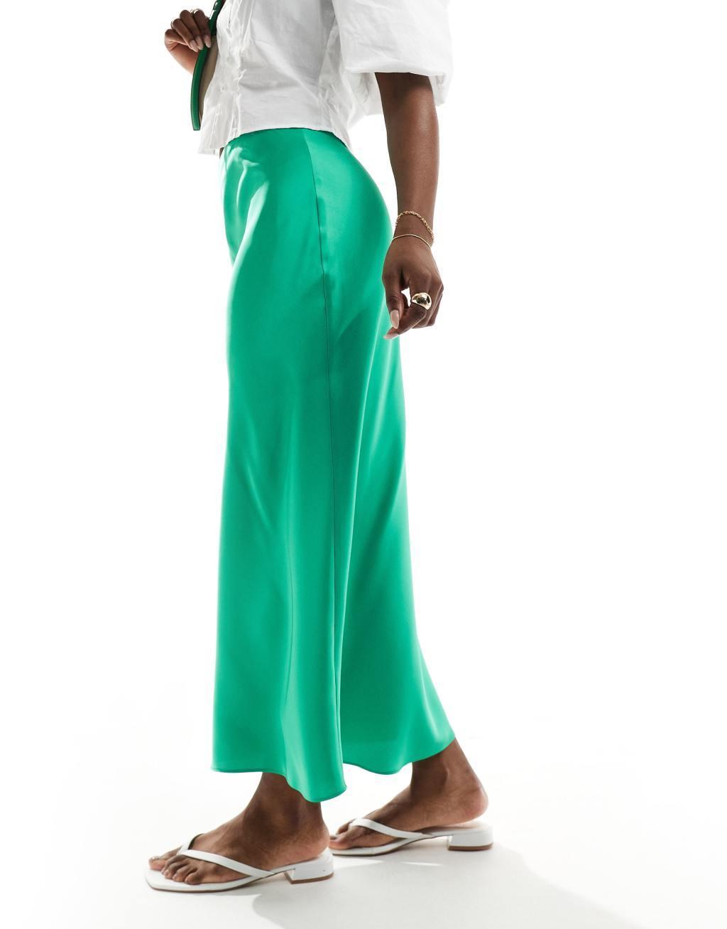 ASOS DESIGN satin bias cut midi skirt in green Product Image