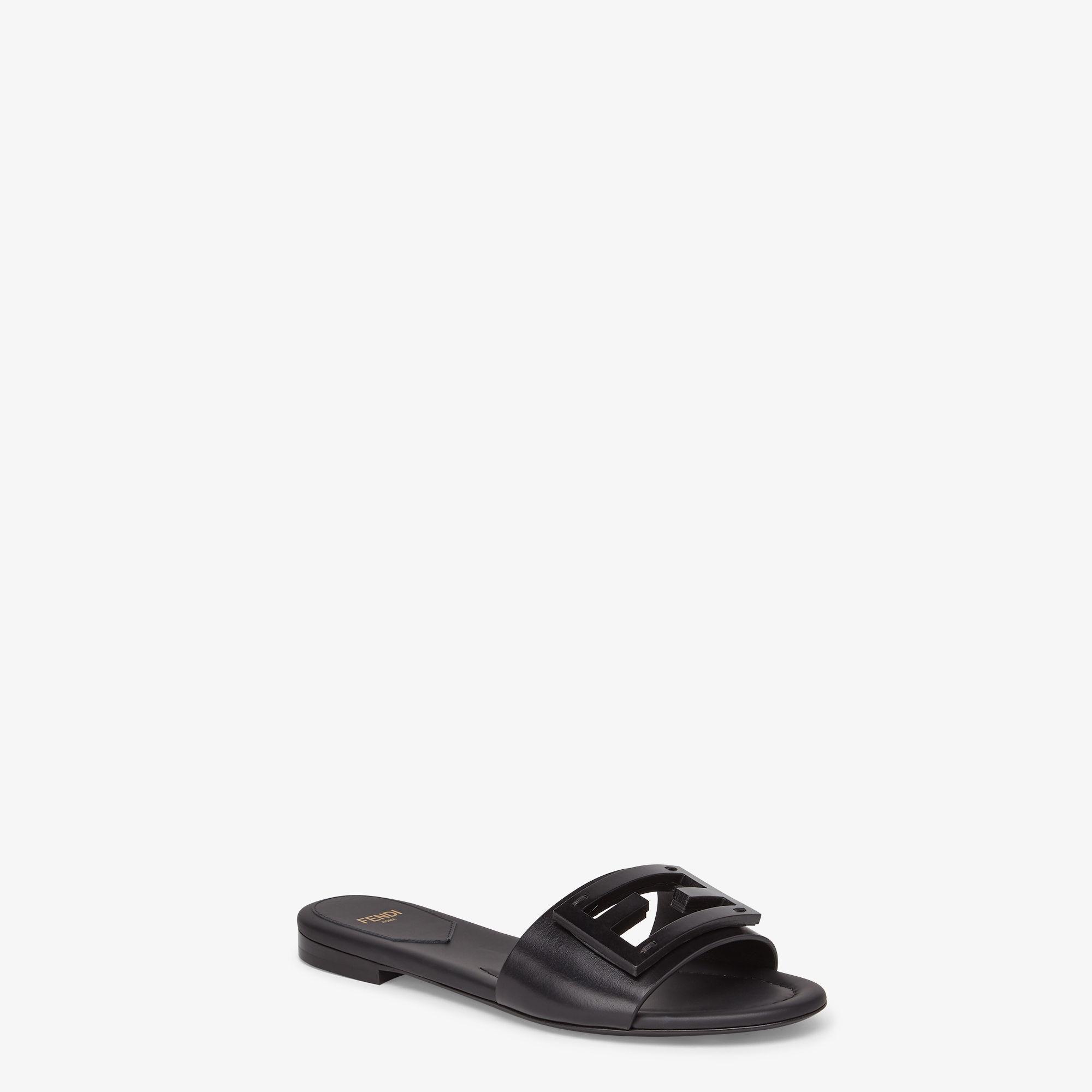 BaguetteBlack leather slides Product Image