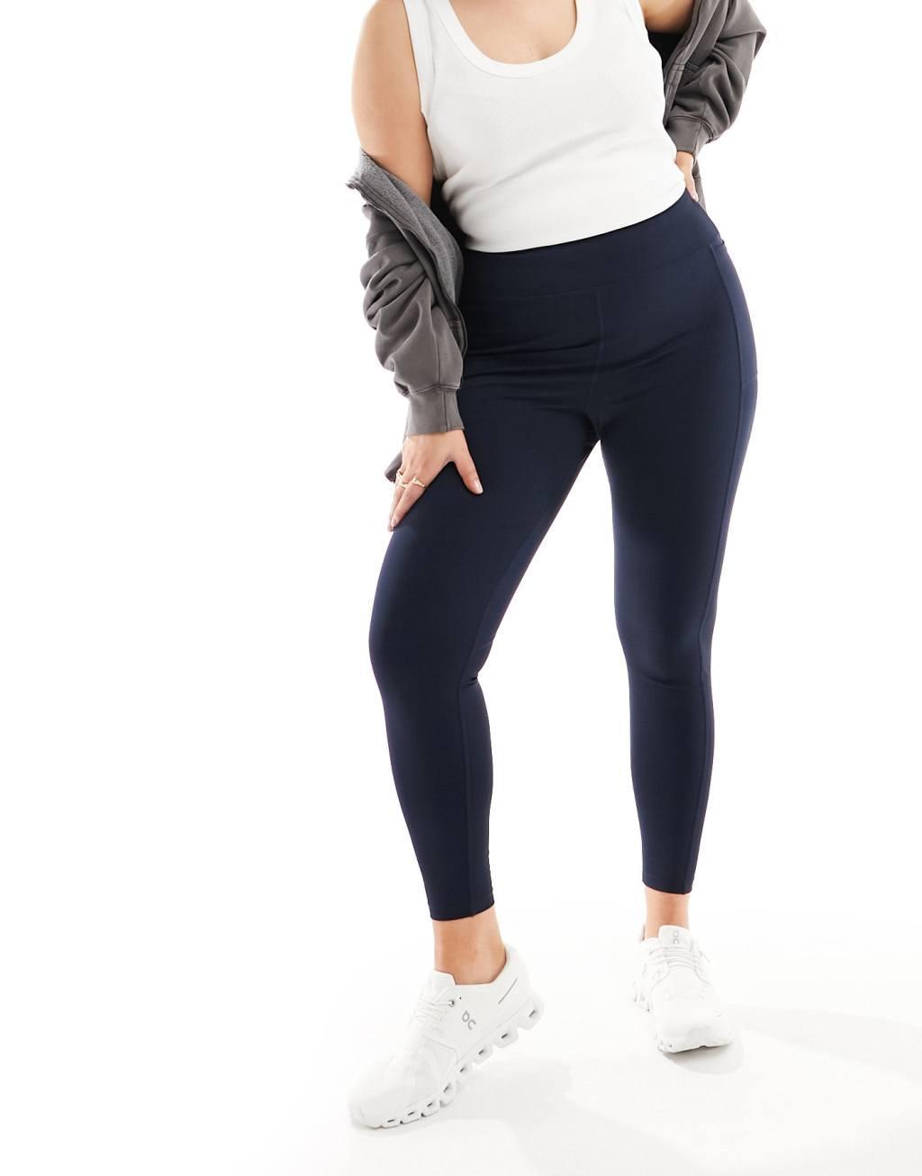 ASOS 4505 CurveIcon running tie waist gym leggings with phone pocket in navy Product Image