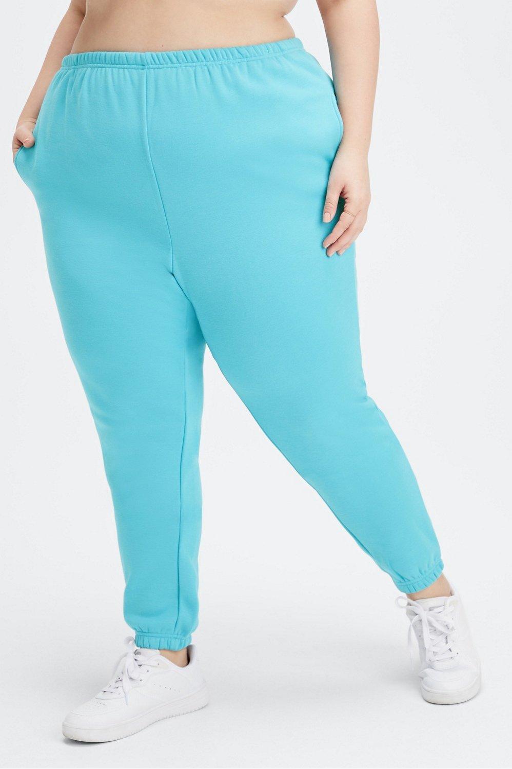 Fabletics Go-To High-Waisted Slim Sweatpant Womens blue Size S Product Image