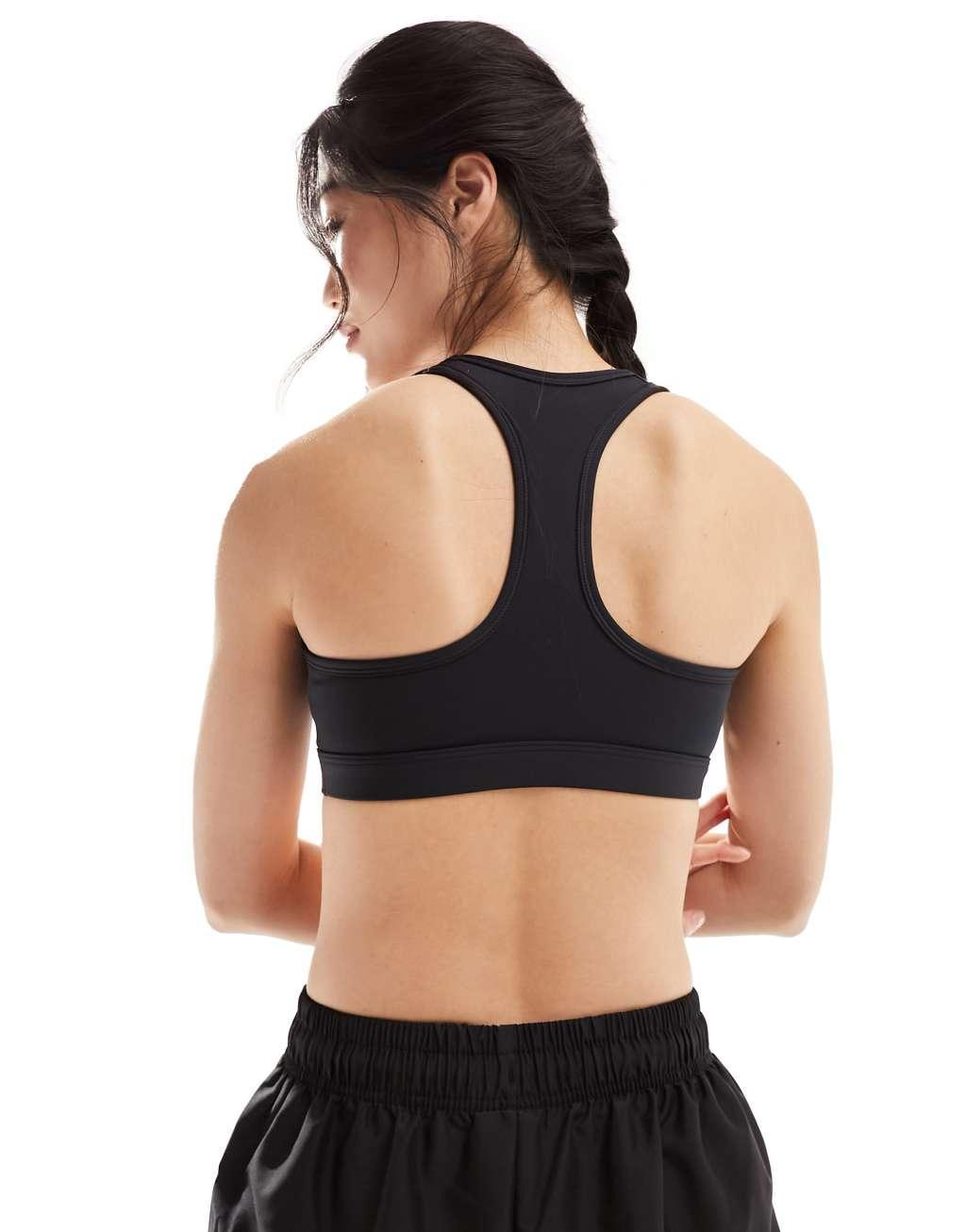 Nike Training swoosh medium support sports bra in black Product Image