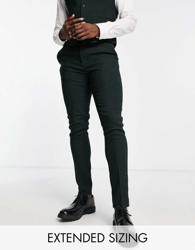 ASOS DESIGN Wedding skinny wool mix suit pants in forest green herringbone  Product Image