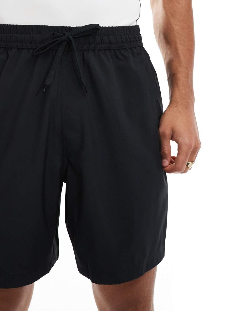 Nike Training Dri-Fit Bodega 7in form shorts in black Product Image