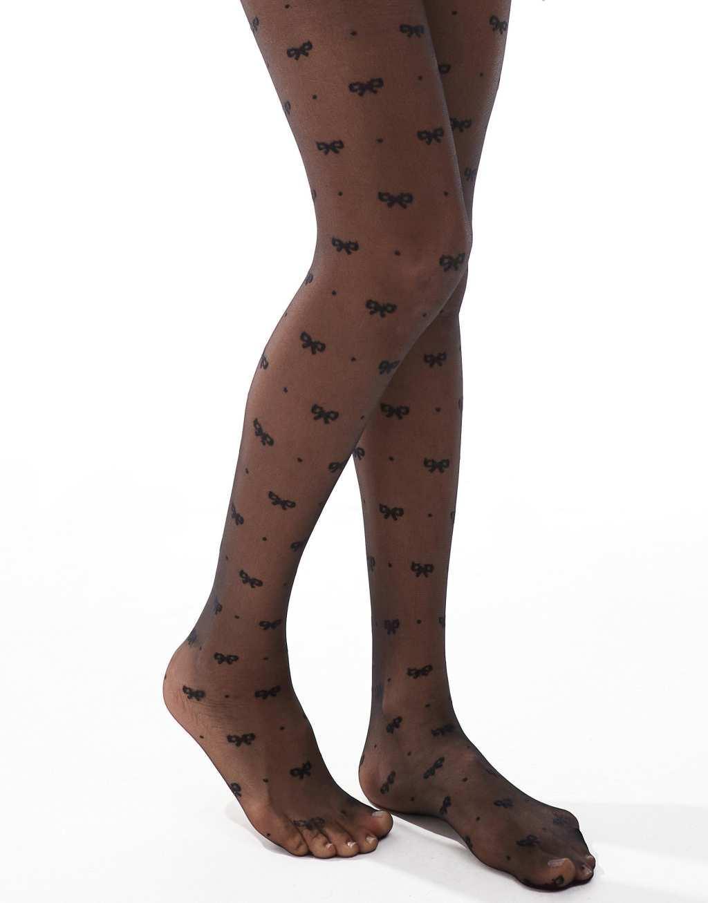 ASOS DESIGN bow and dot tights in black Product Image