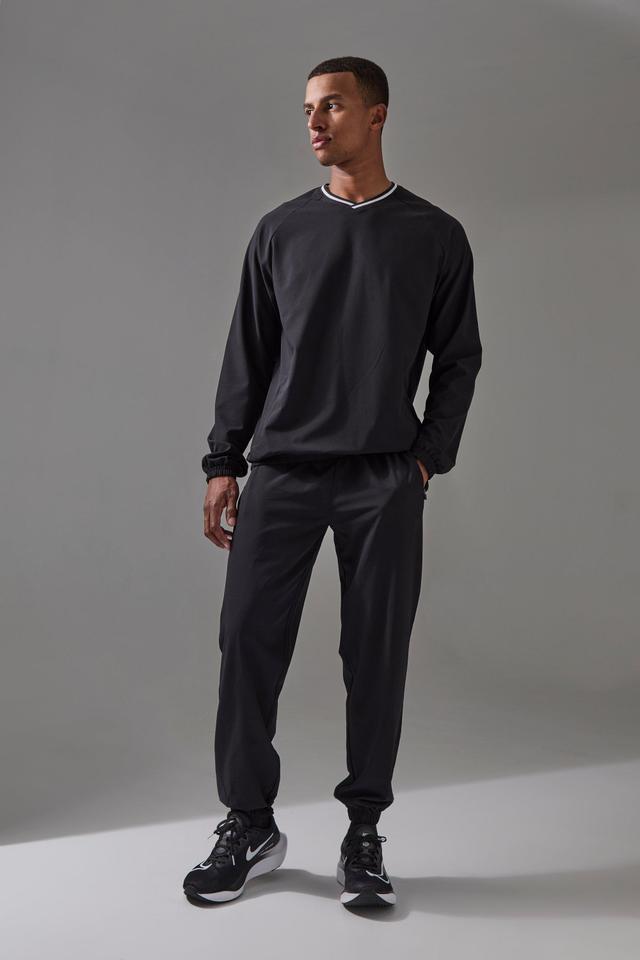 Man Active Pro Sweatshirt And Cuffed Sweatpants Tracksuit | boohooMAN USA Product Image