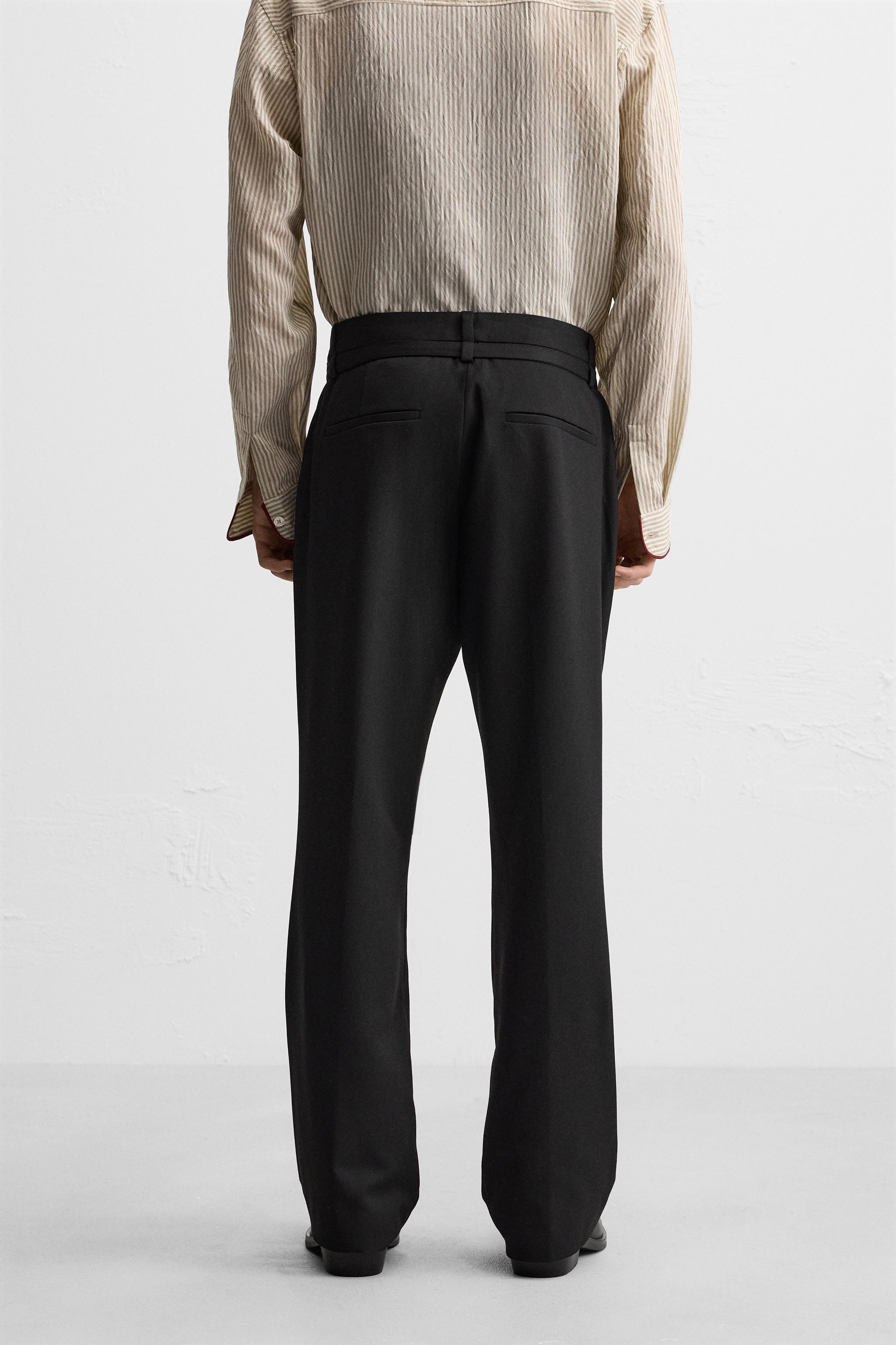 FLARED FIT PANTS WITH BELT Product Image