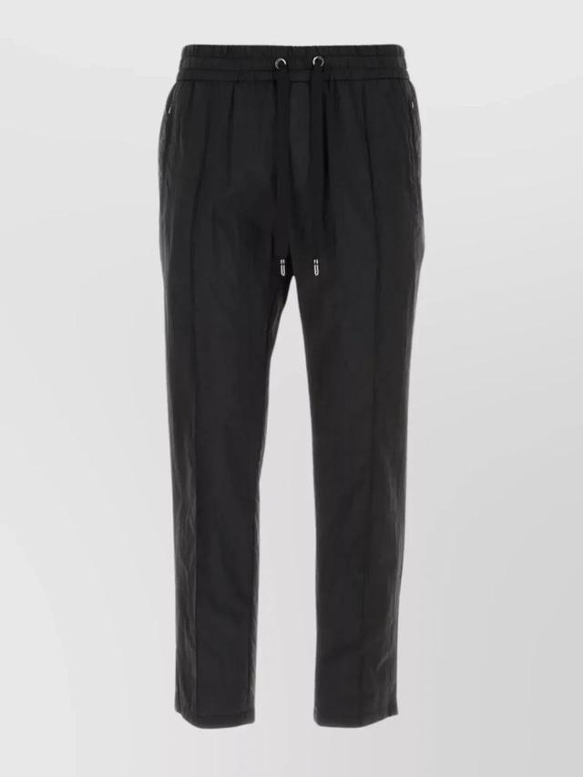 Pleated Nylon Tapered Trousers With Zip Pockets In Black Product Image