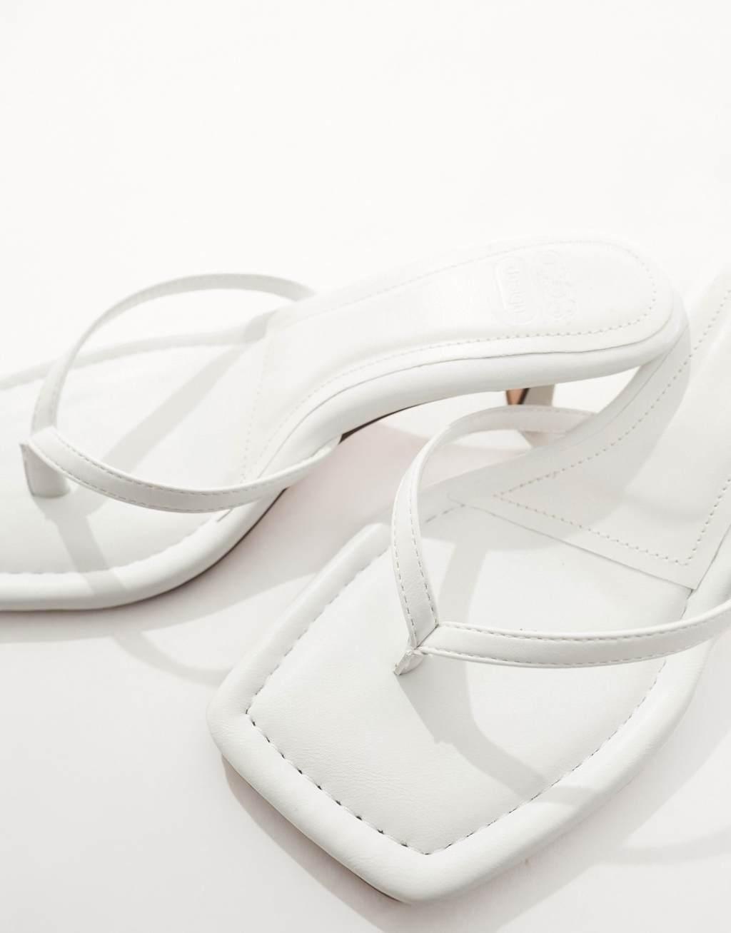 ASOS DESIGN Heatwave toe thong kitten heeled sandals in white Product Image