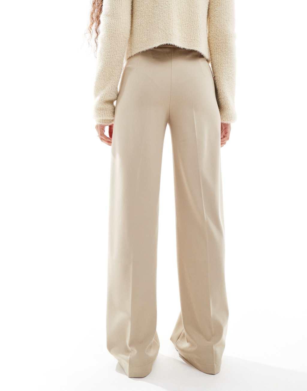 Bershka Petite wide leg dad pants in sand Product Image