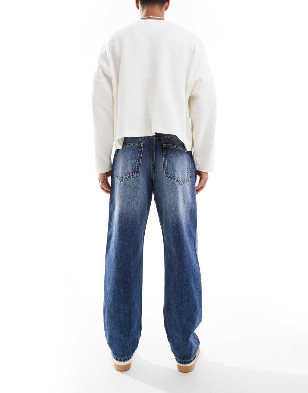 Bershka washed horseshoe jeans in blue  Product Image