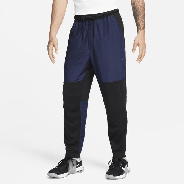 Nike Men's Unlimited Water-Repellent Zippered Cuff Versatile Pants Product Image