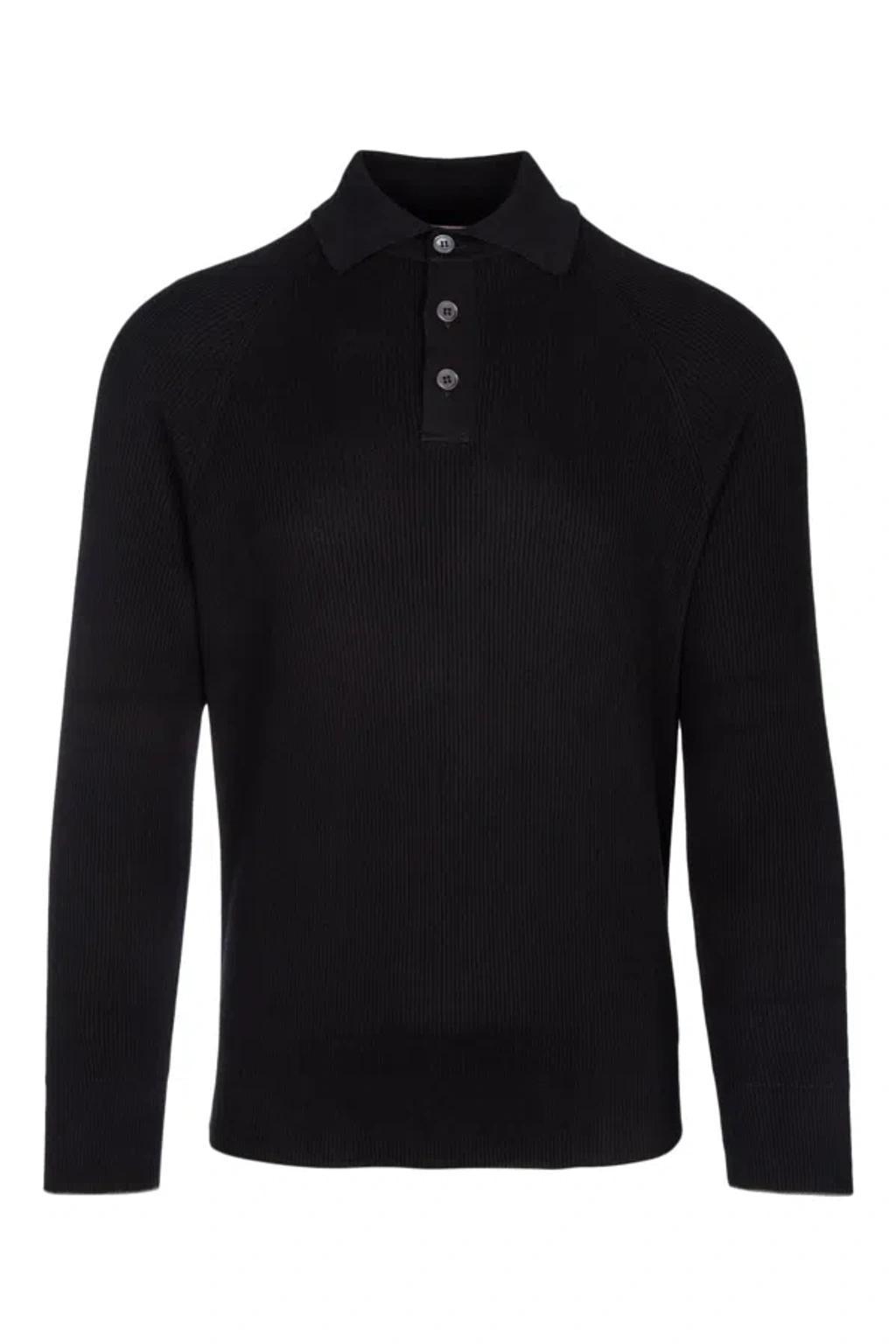 Long Sleeved Buttoned Polo Shirt In Black Product Image