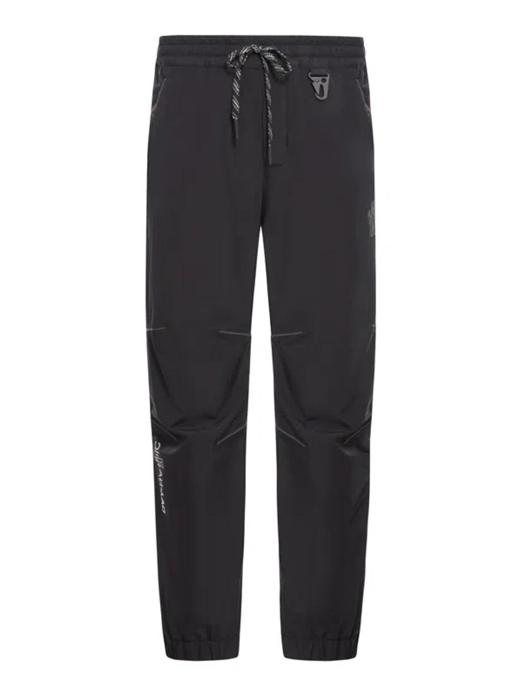 Grenoble Logo Embossed Drawstring Track Pants In Black Product Image