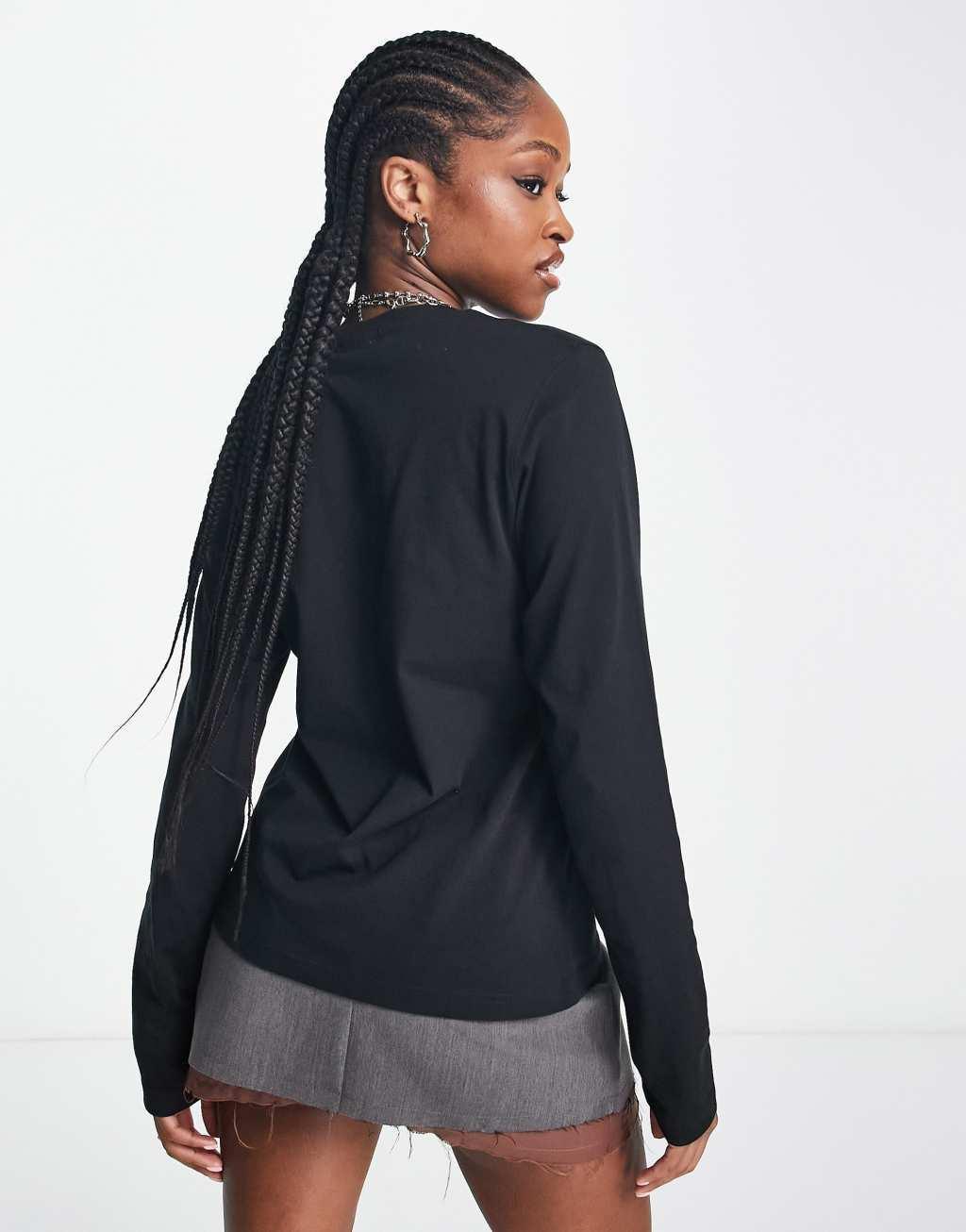 Weekday Essence standard long sleeve top in black Product Image