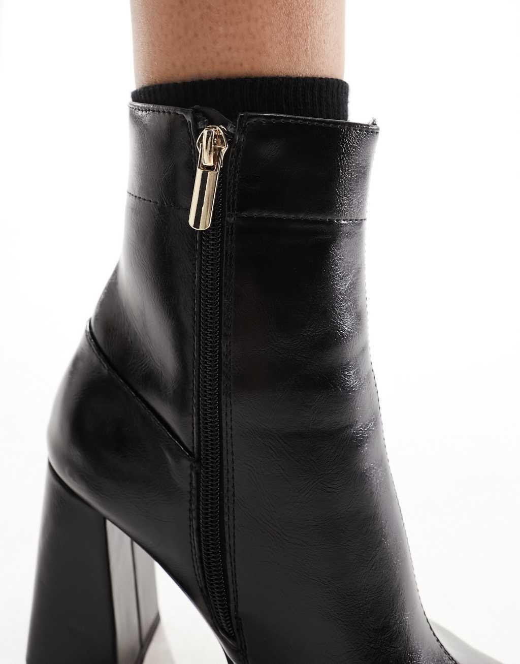 ASOS DESIGN Wide Fit Everest flared heel boots in black Product Image