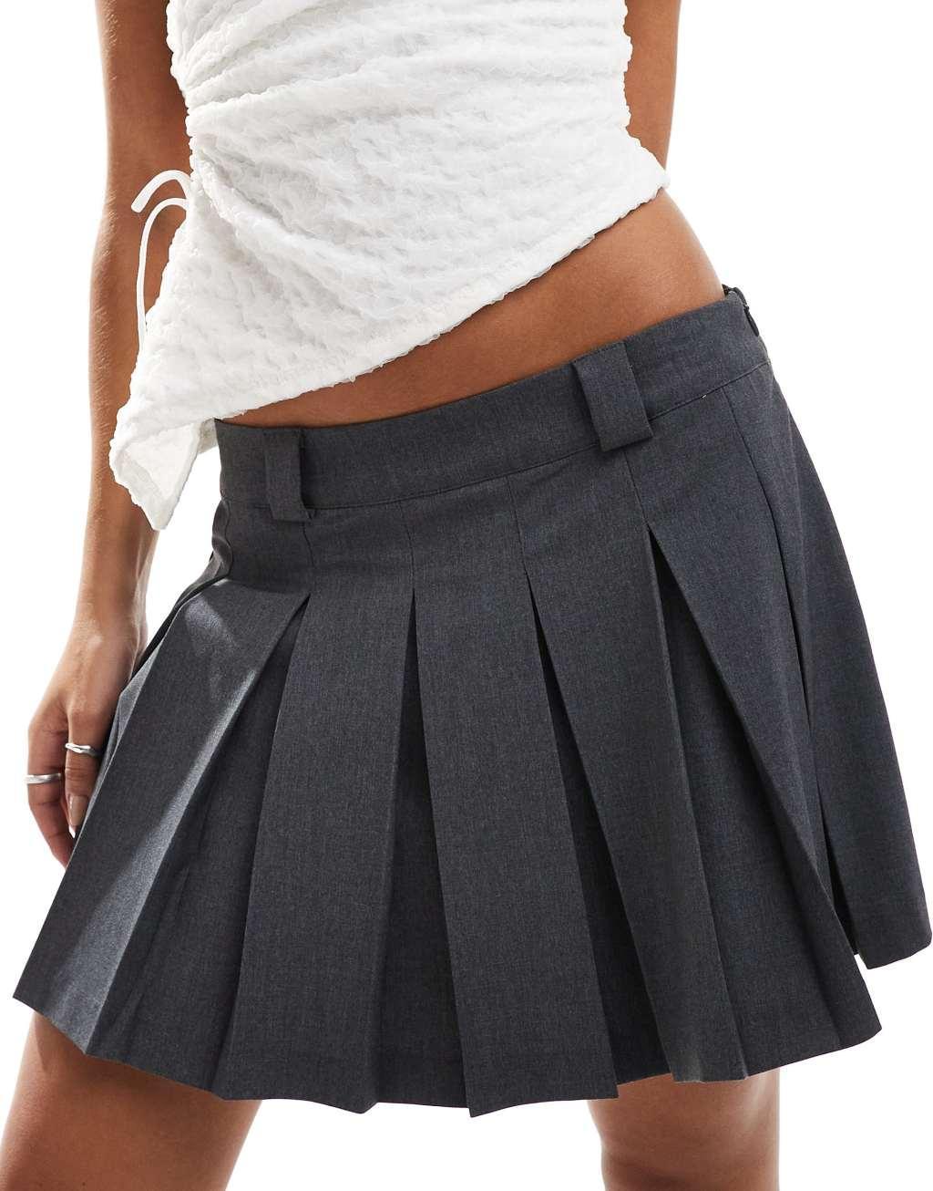 Monki pleated mini skirt with raw hem in gray Product Image