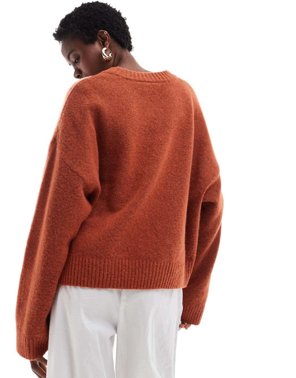 Monki round neck relaxed knitted sweater in rust red Product Image