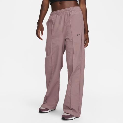 Nike Trend woven baggy parachute pants in smokey mauve Product Image