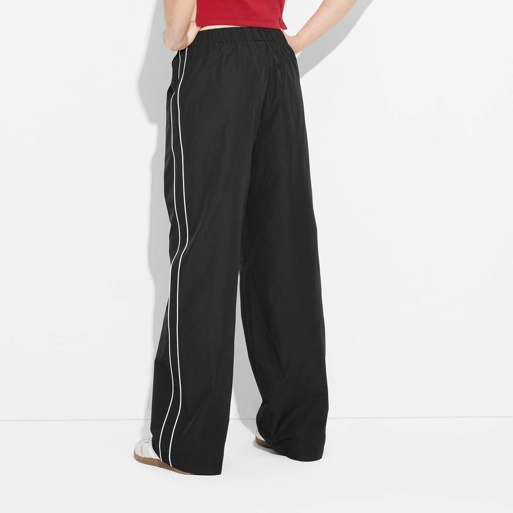 Women's Game Day Mid-Rise Wide Leg Track Pants - Wild Fable™ Black XXS Product Image