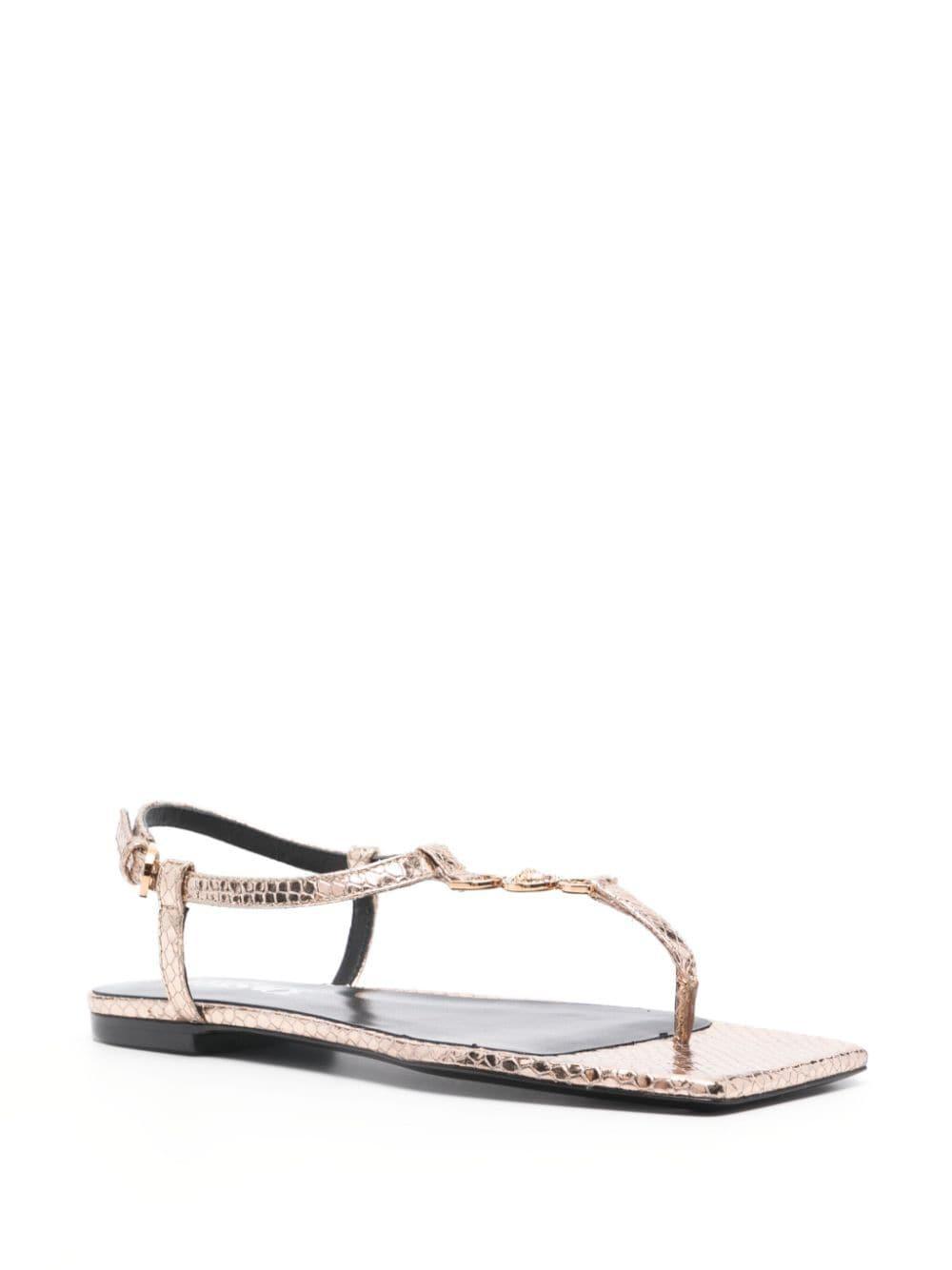 Medusa Metallic T-strap Flat Sandals In Gold Product Image