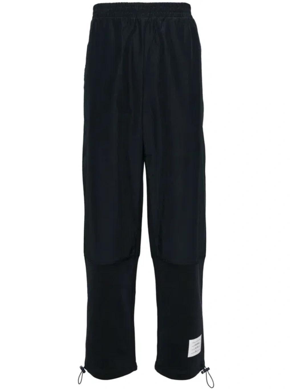 Ripstop Tapered-leg Trousers In Navy Product Image