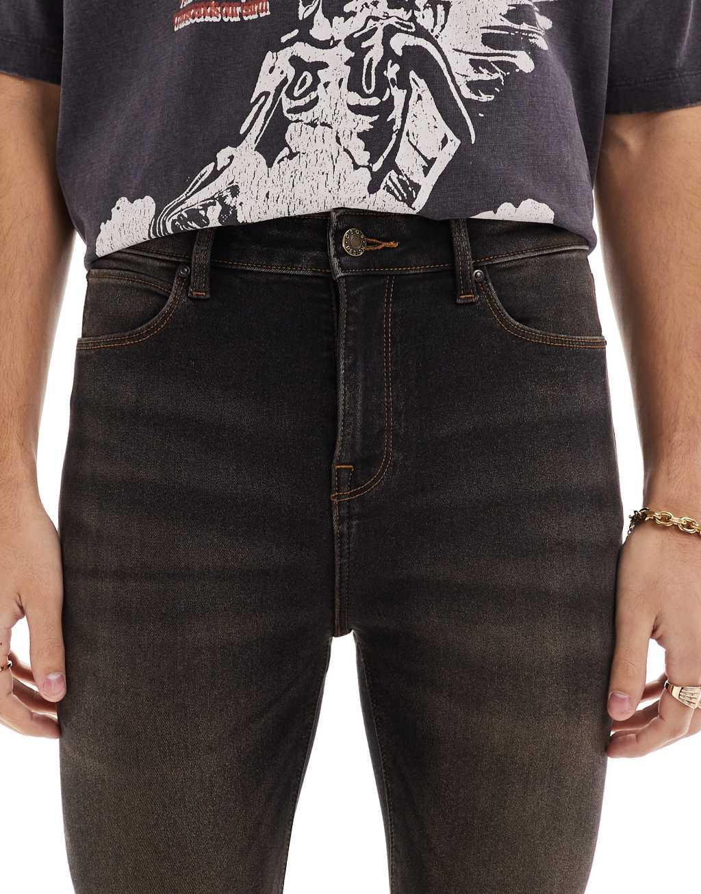 ASOS DESIGN spray on jeans in brown Product Image