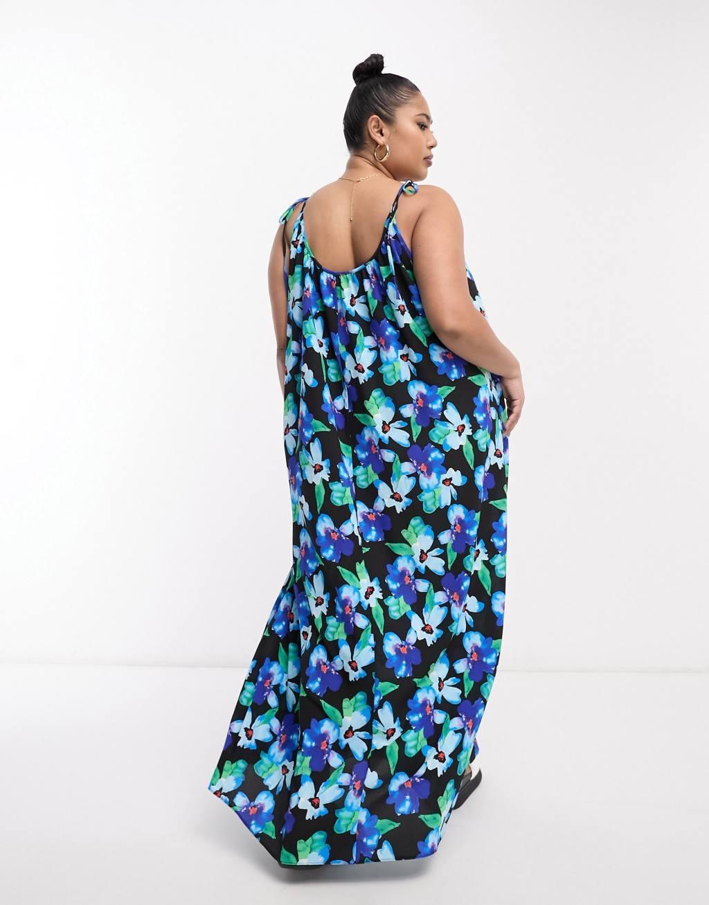 ASOS DESIGN Curve tie strap detail trapeze maxi slip dress in blue floral print Product Image