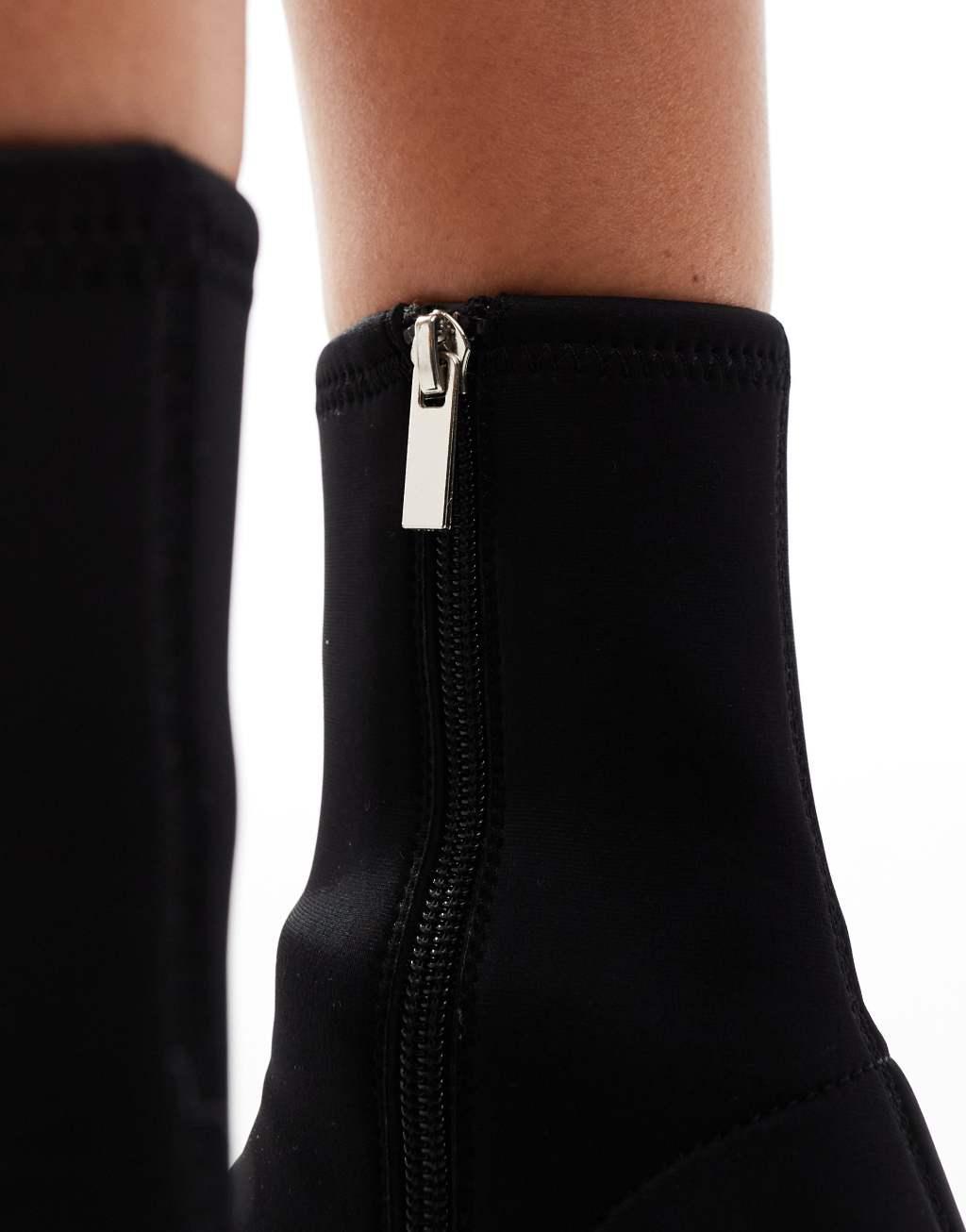 ASOS DESIGN Radiant flared block heel boots in black neoprene Product Image