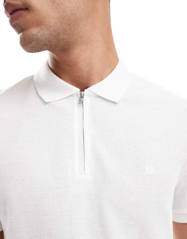 Jack & Jones waffle zip-up polo in white Product Image