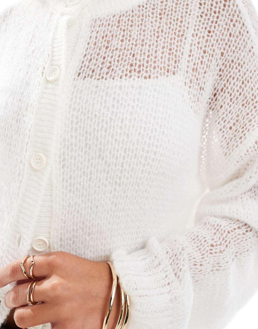 ASOS DESIGN crew neck cardigan in loose knit in cream Product Image