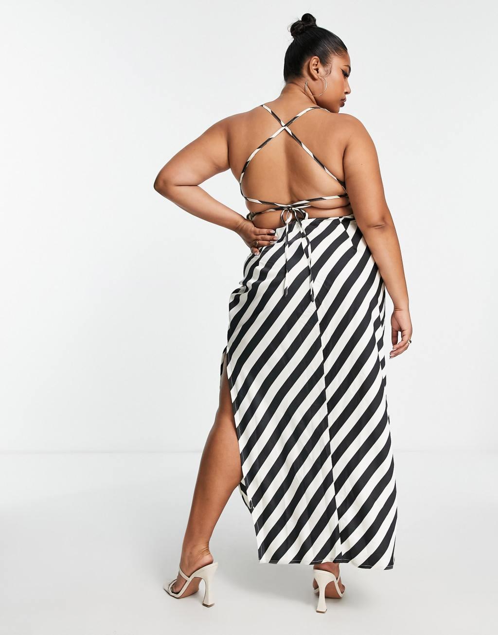 In The Style Plus satin side split maxi dress with lace up back detail in monochrome stripe Product Image