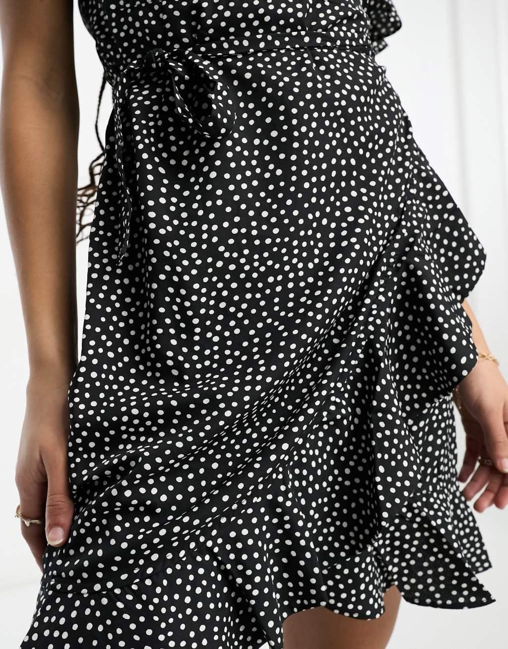 Vero Moda wrap mini dress in black dot print Product Image