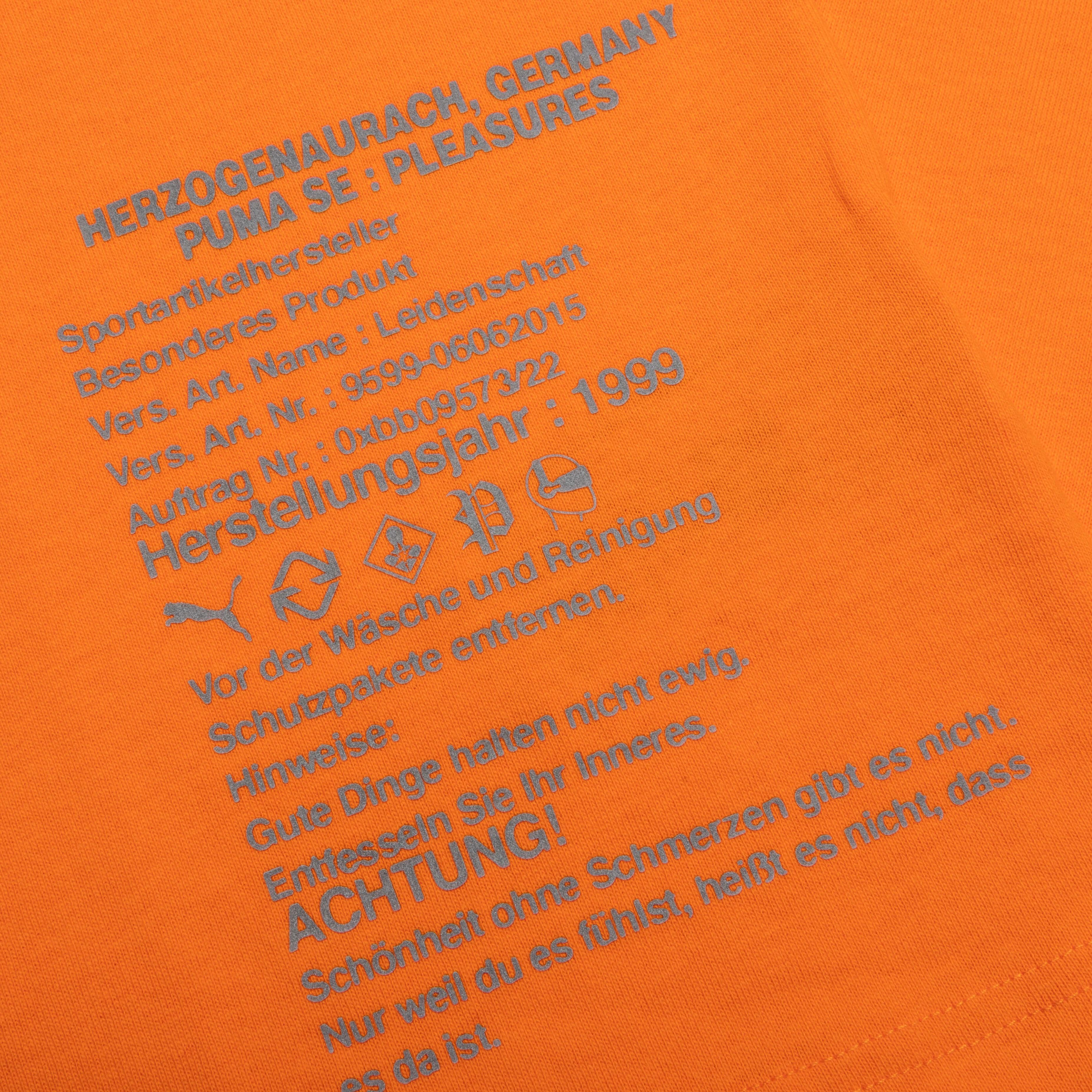 Puma x Pleasures Typo Tee - Orange Male Product Image