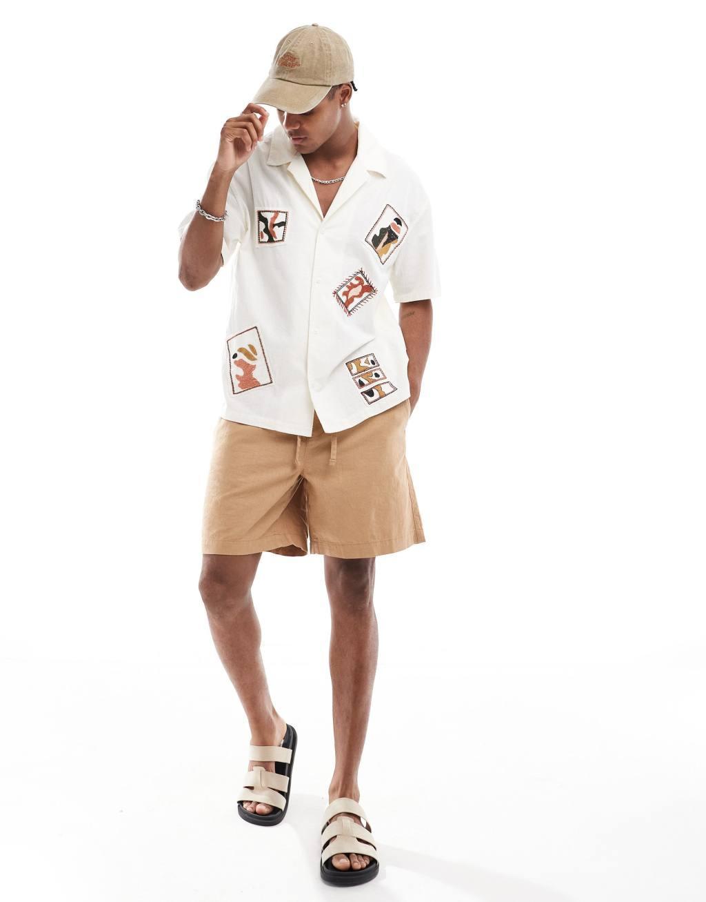 Bershka floral embroidered stitch shirt in beige Product Image