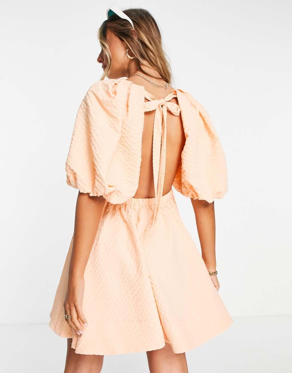 ASOS DESIGN open back puff sleeve mini dress in apricot texture Product Image