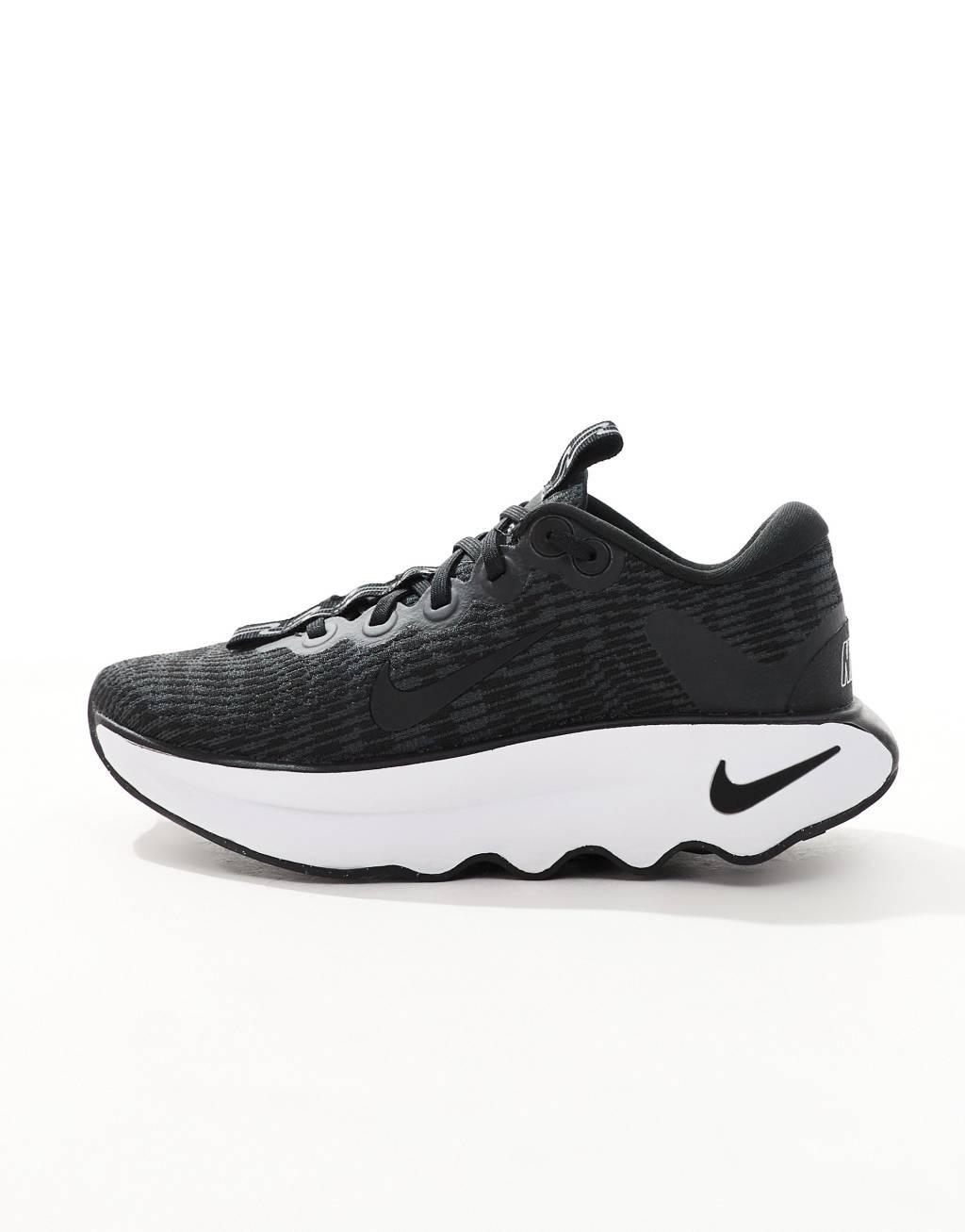 Nike Training Motiva sneakers in black and white Product Image