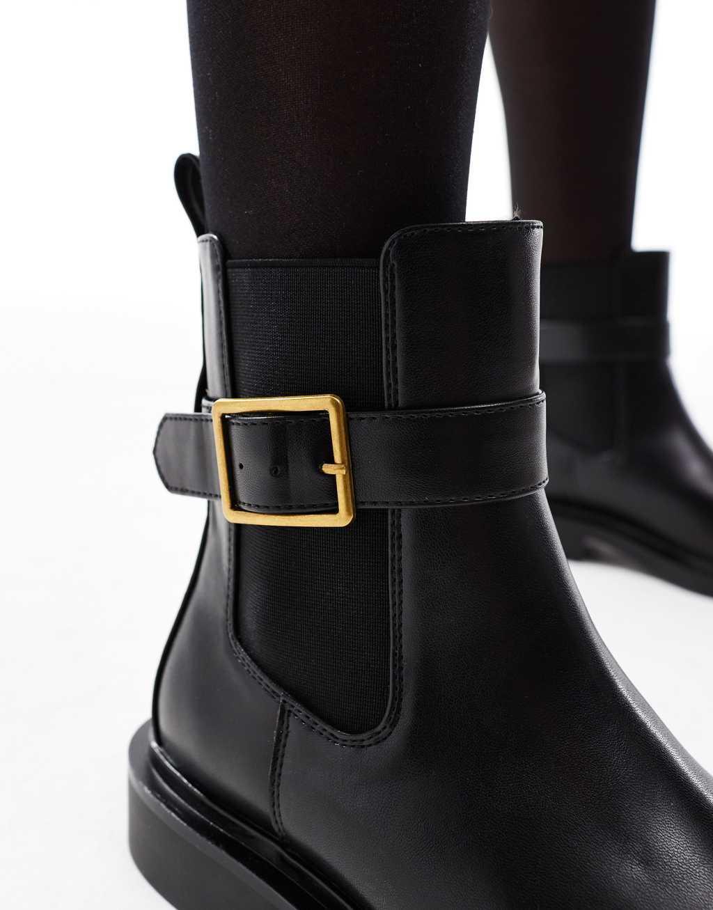 ASOS DESIGN Wide Fit Aurora flat boots with buckle strap in black Product Image