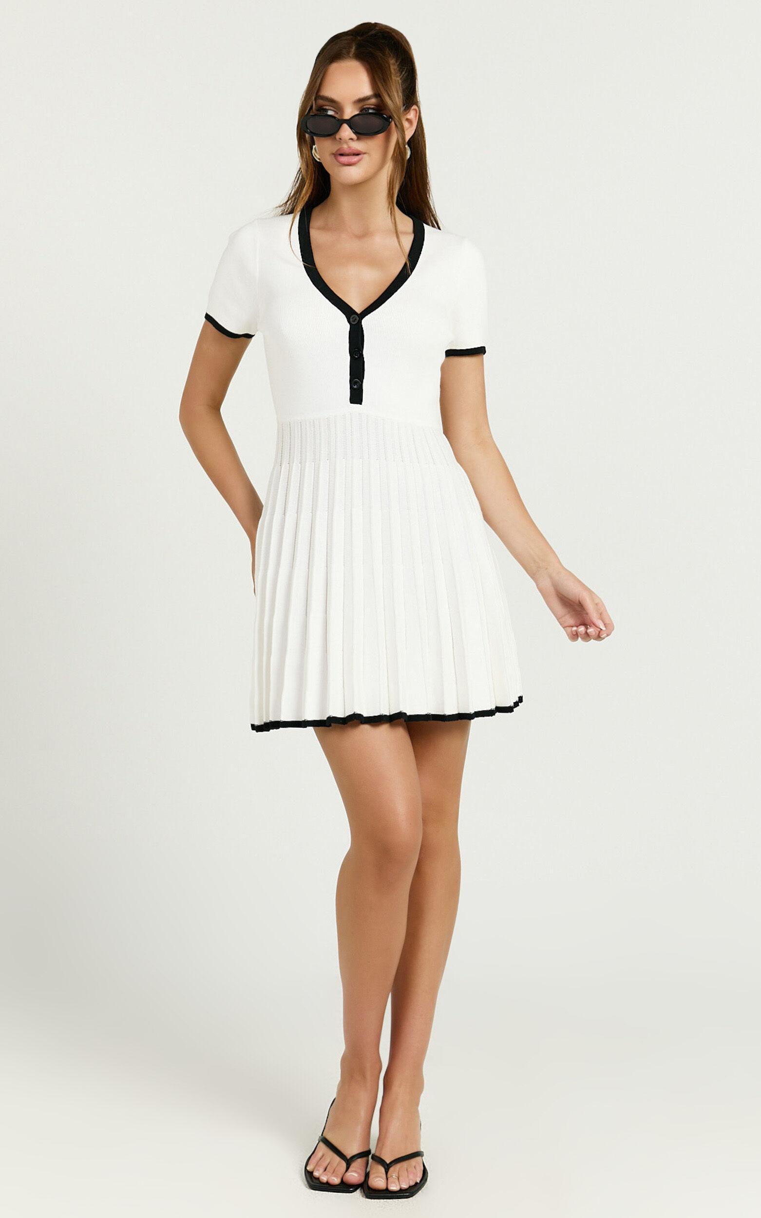 Vivienne Mini Dress - Short Sleeve Pleated Skirt Knitted Dress in Cream Product Image