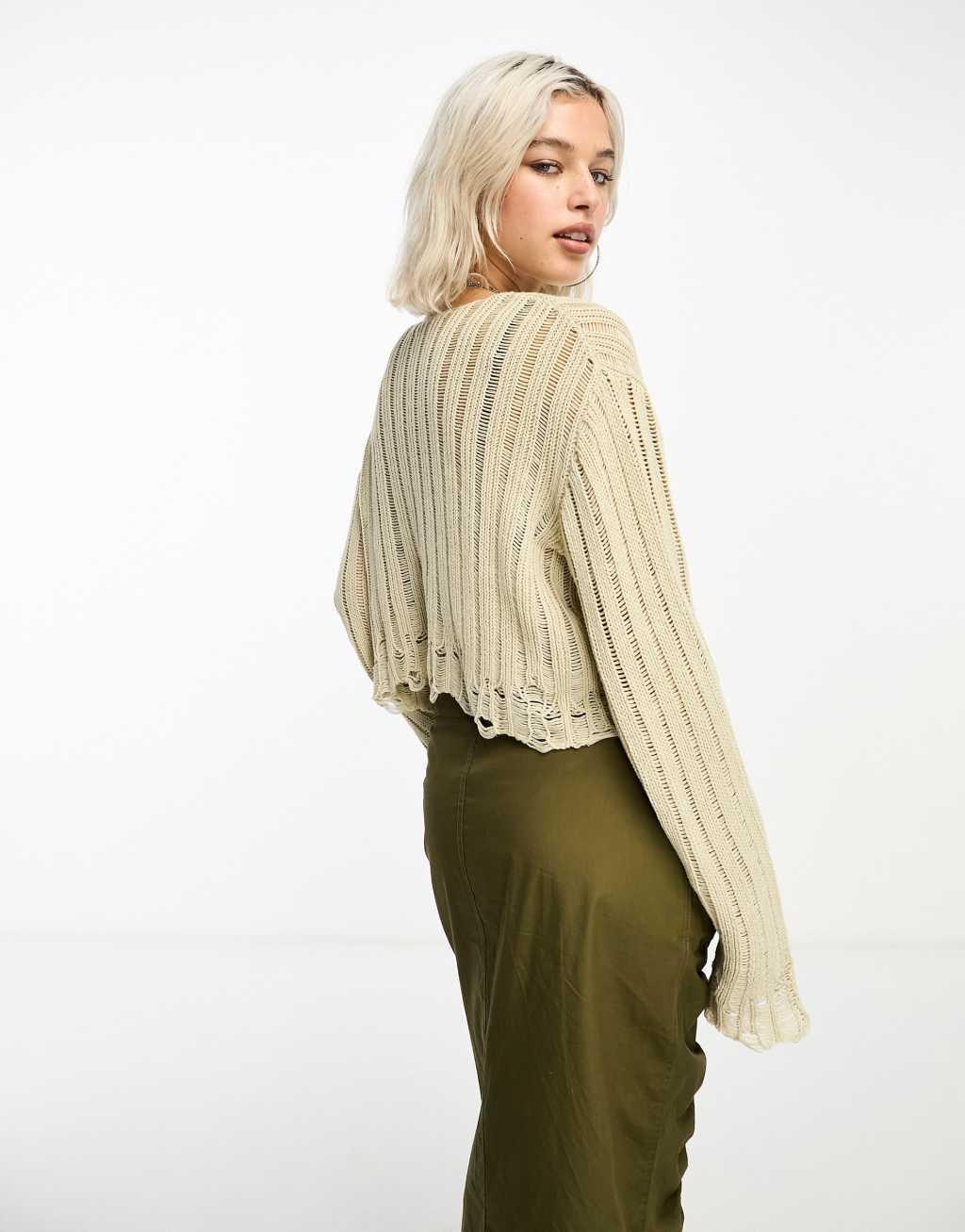 COLLUSION cropped distressed nibbled hem sweater in stone Product Image